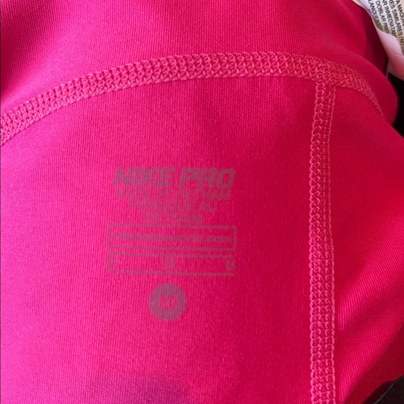 Nike Pro Women’s Hot Pink Bike Shorts with Black Waistband - Picture 3 of 3